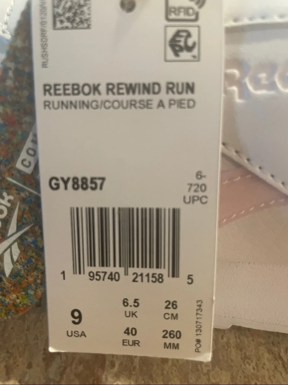 Reebok Women's Classic White Sneakers with Pink Accent size 9